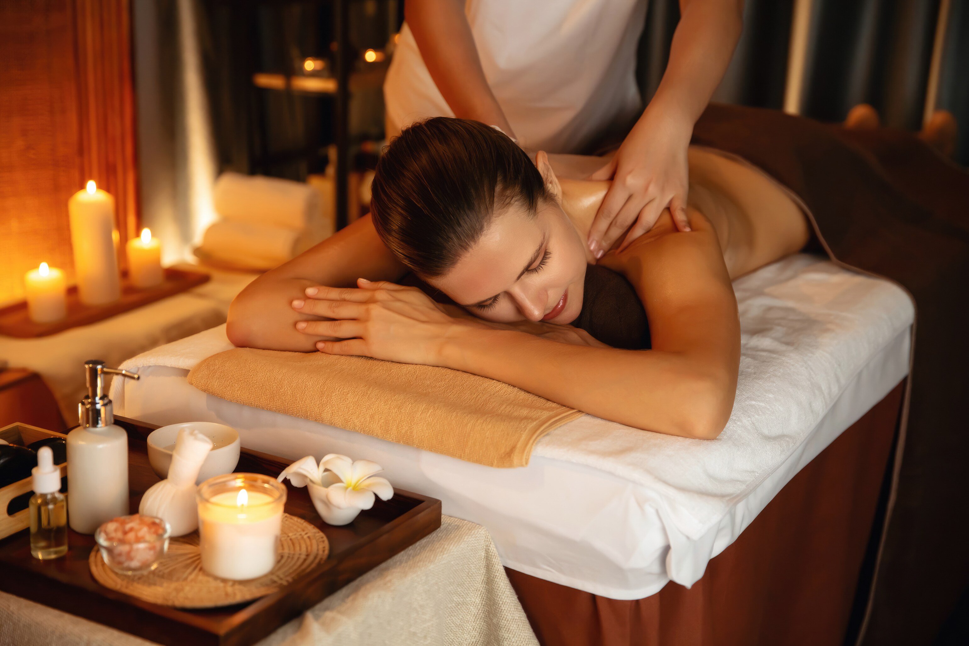 A woman getting a massage in a spa