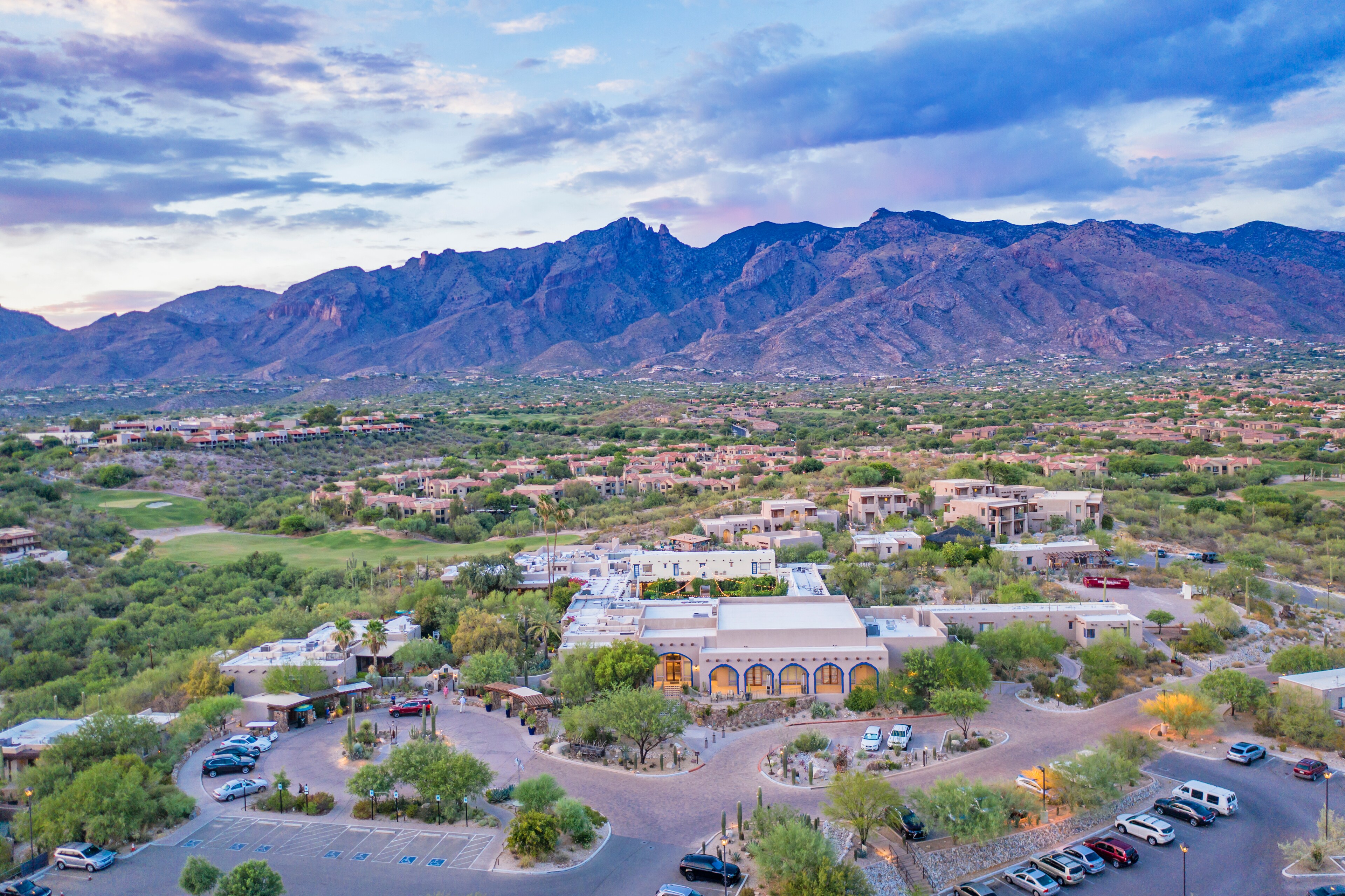 Aerial view of a desert resort with arched buildings surrounded by greenery at Hacienda Del Sol, Arizona, US
