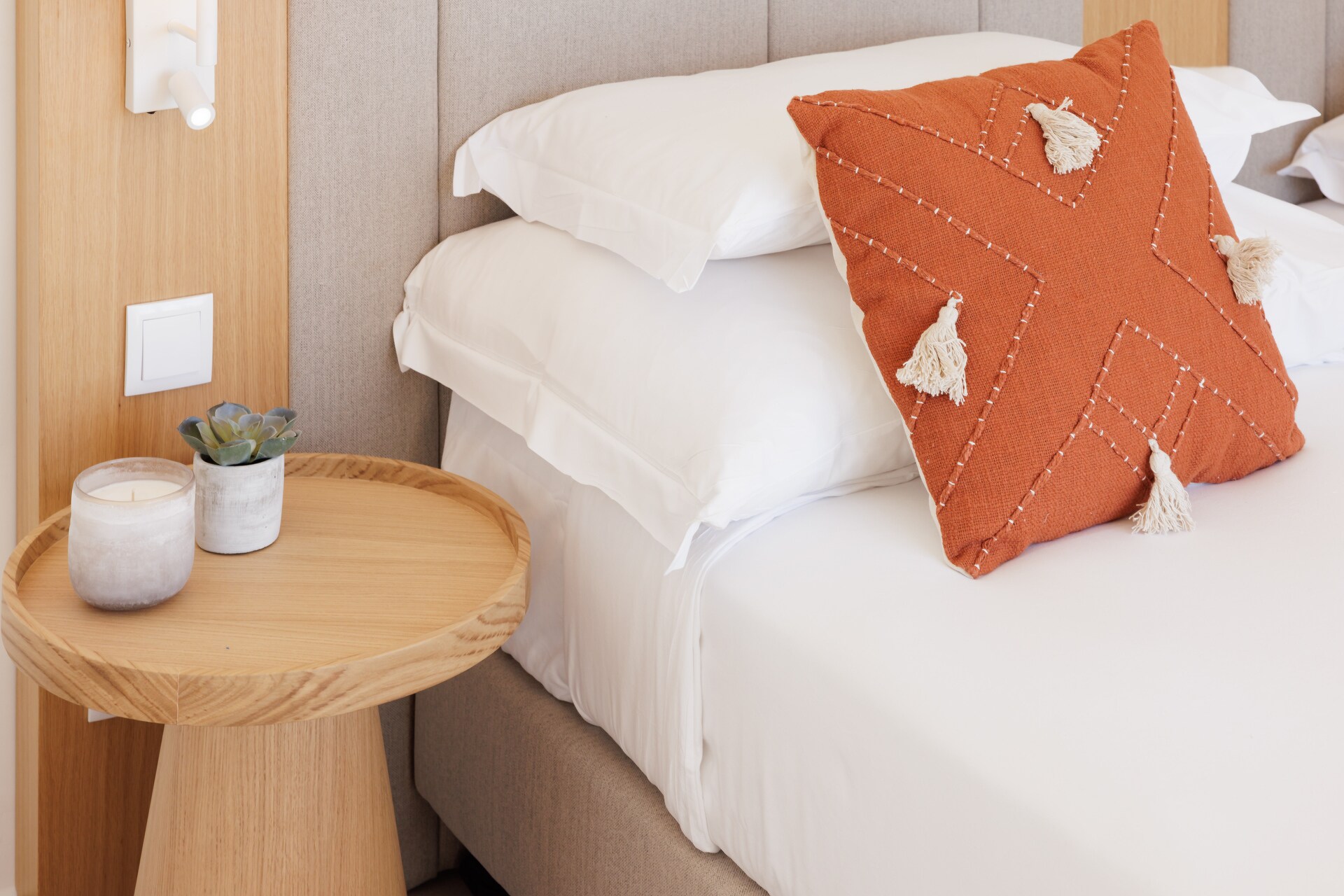 Cozy Bed Adorned with White Sheets and Fluffy Pillows in Flamingos Salgados, Faro