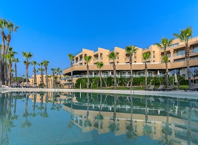 outdoor view of 5 star hotel with pool in the algarve
