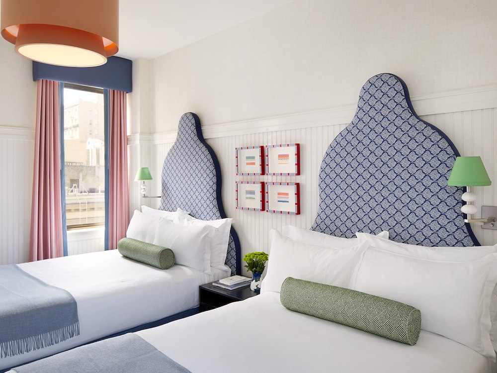 Double bed hotel room with chic decor at Hotel Triton Union Square San Francisco, CA