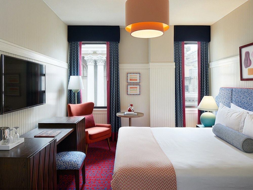 Executive King hotel room with modern decor at Hotel Triton Union Square San Francisco, CA