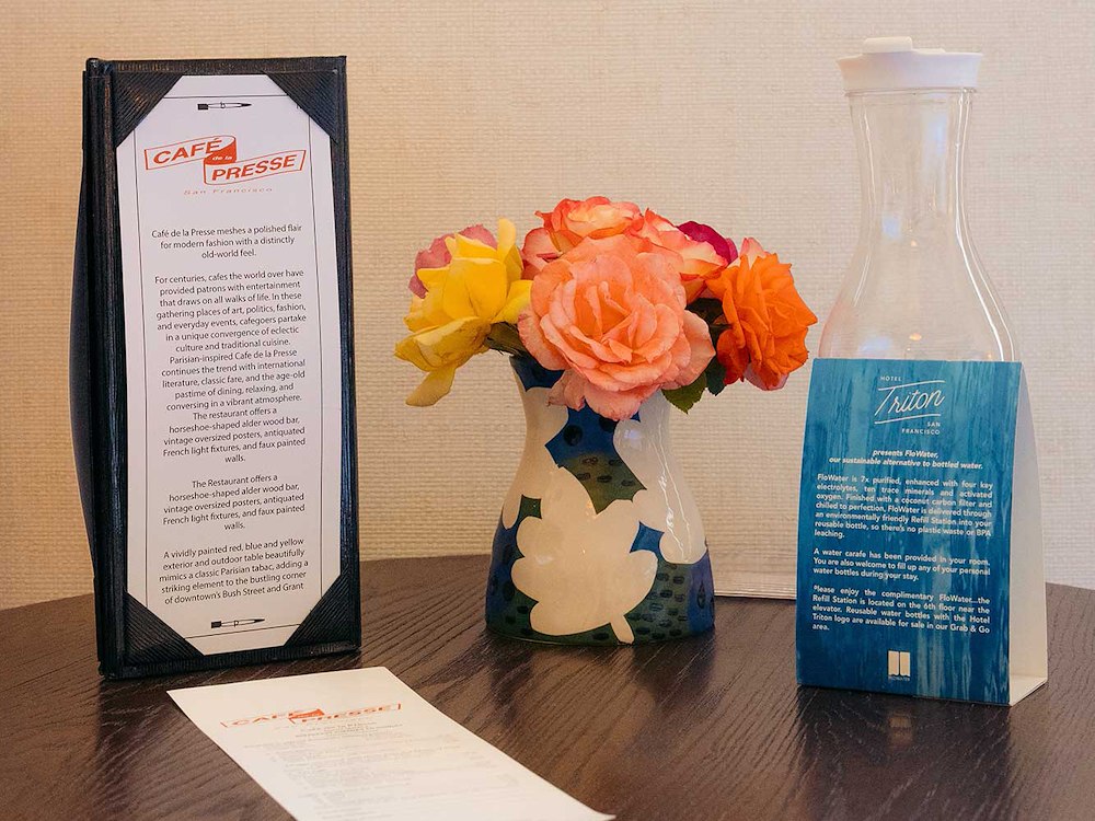 Welcome amenities with flowers in guest room at Hotel Triton Union Square San Francisco