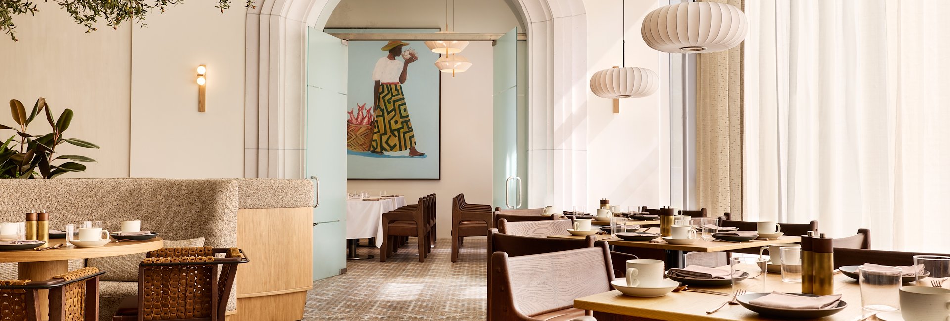 Mediterranean-inspired dining room with archways and warm décor