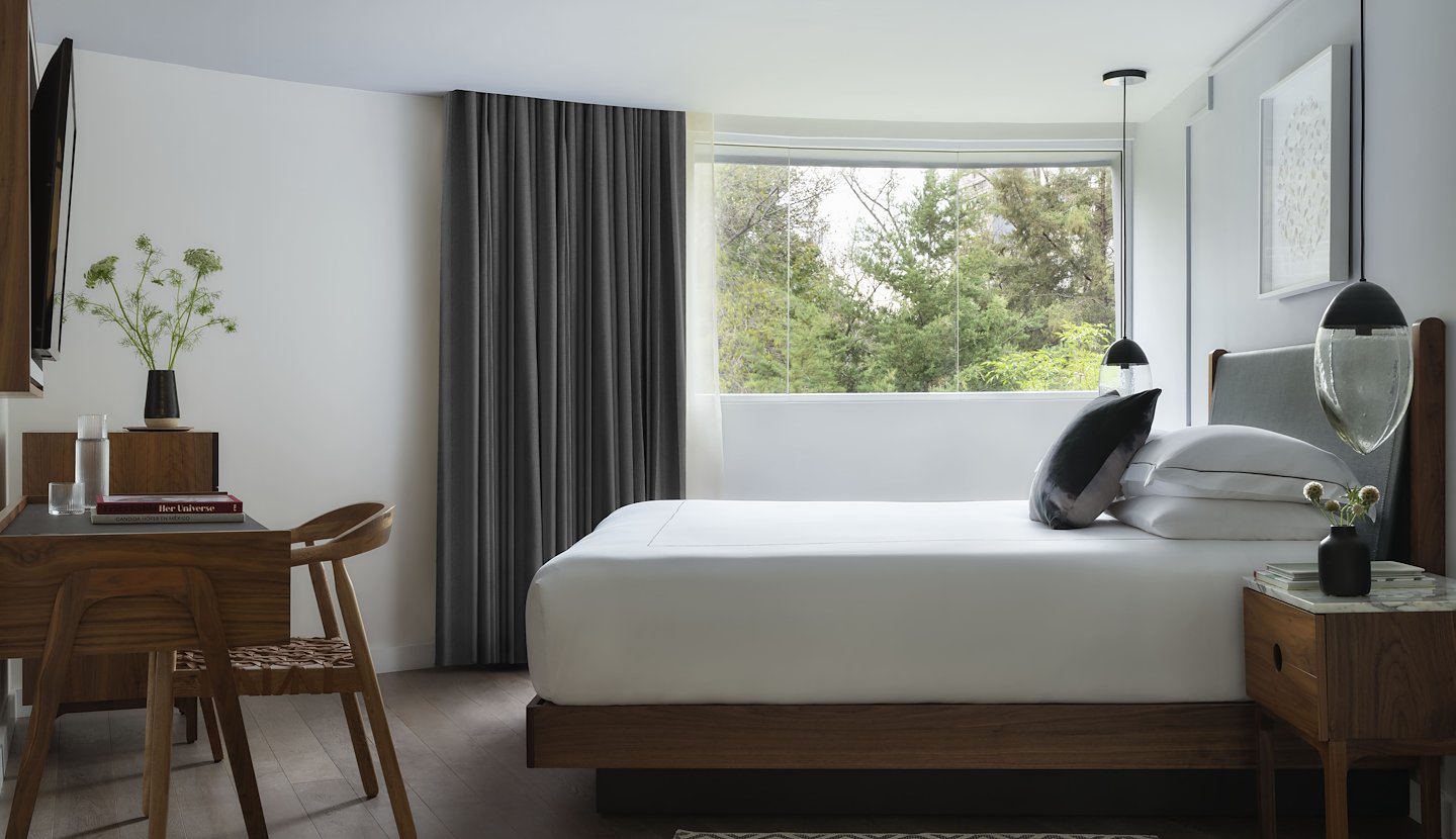 A hotel room with two beds and a couch, Kimpton Virgilio, Mexico City