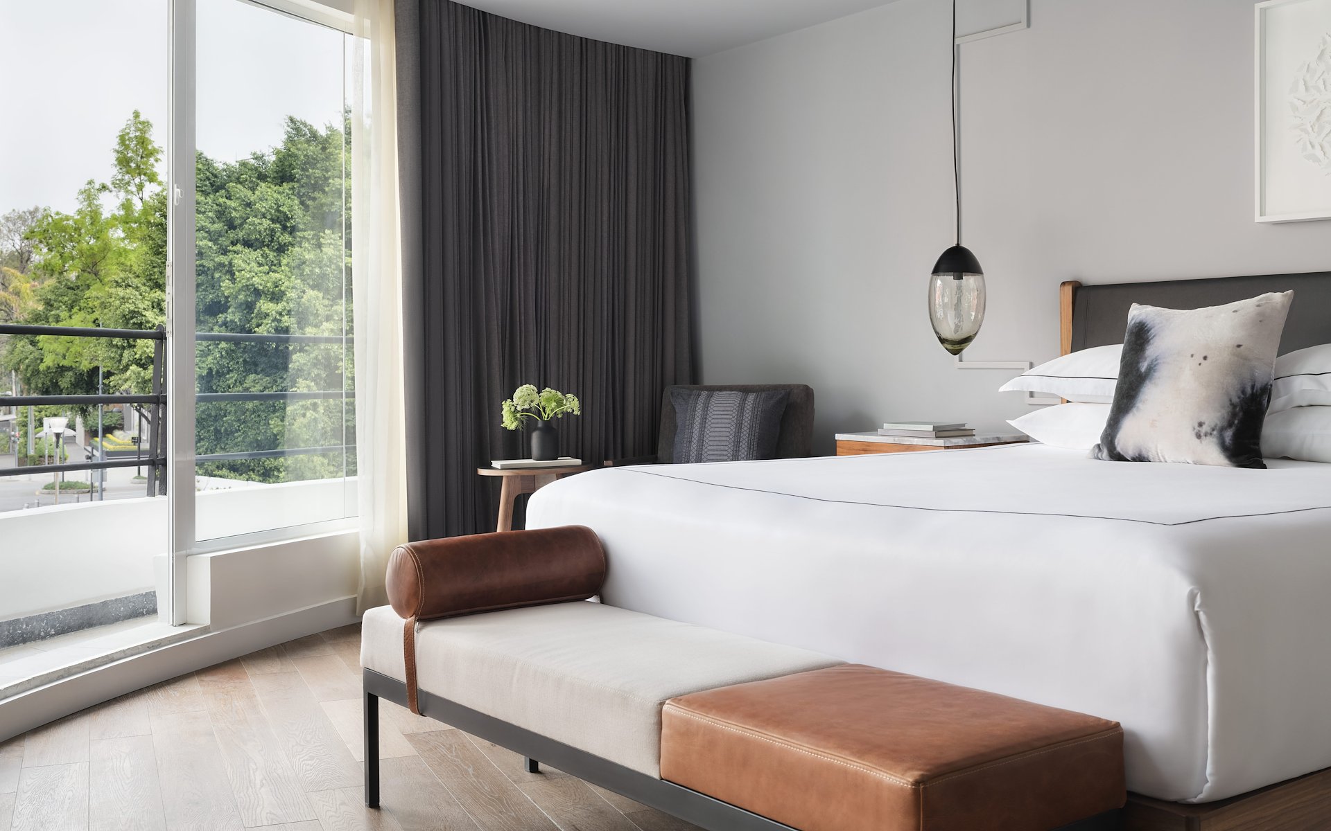A hotel room with a bed, chair and window, Kimpton Virgilio, Mexico City