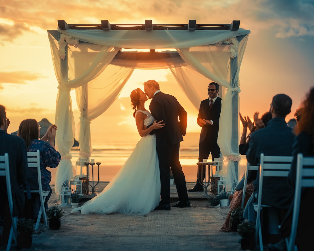 Beach wedding at sunset