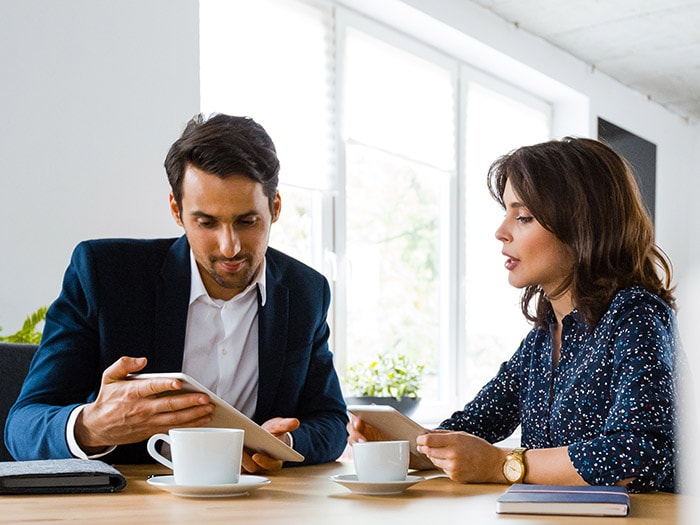 A man and a woman sitting at a table