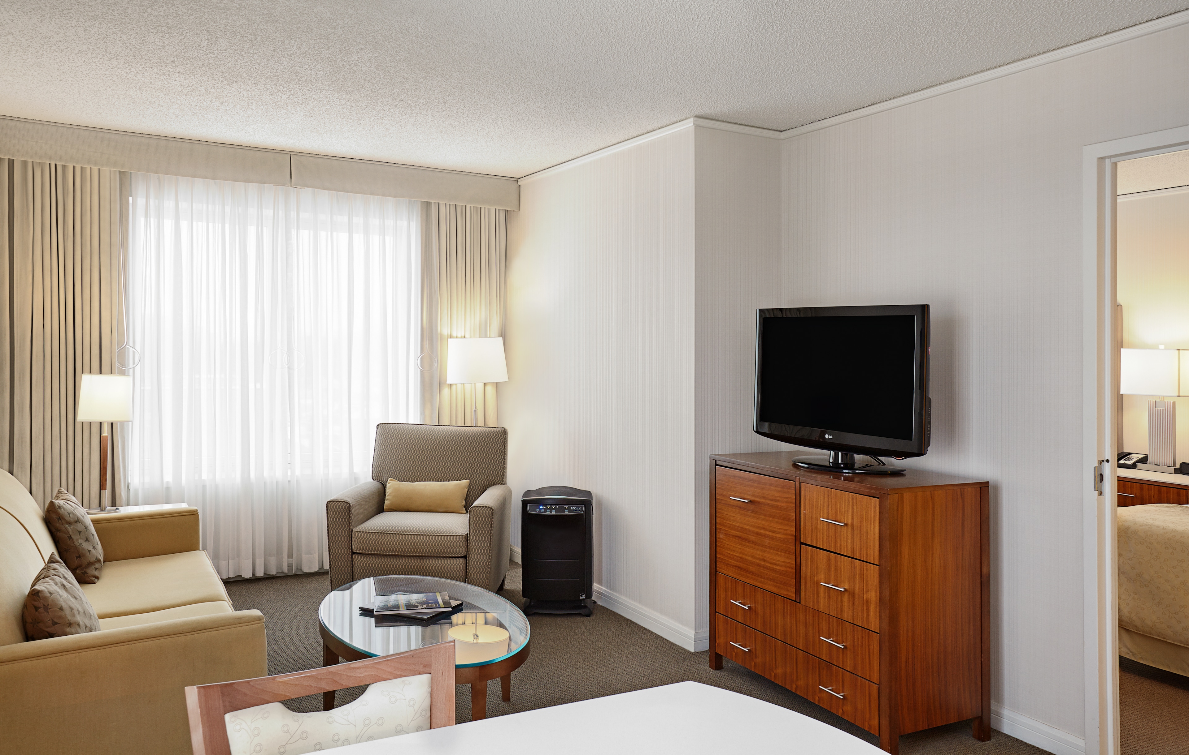 A room with a television and a chair