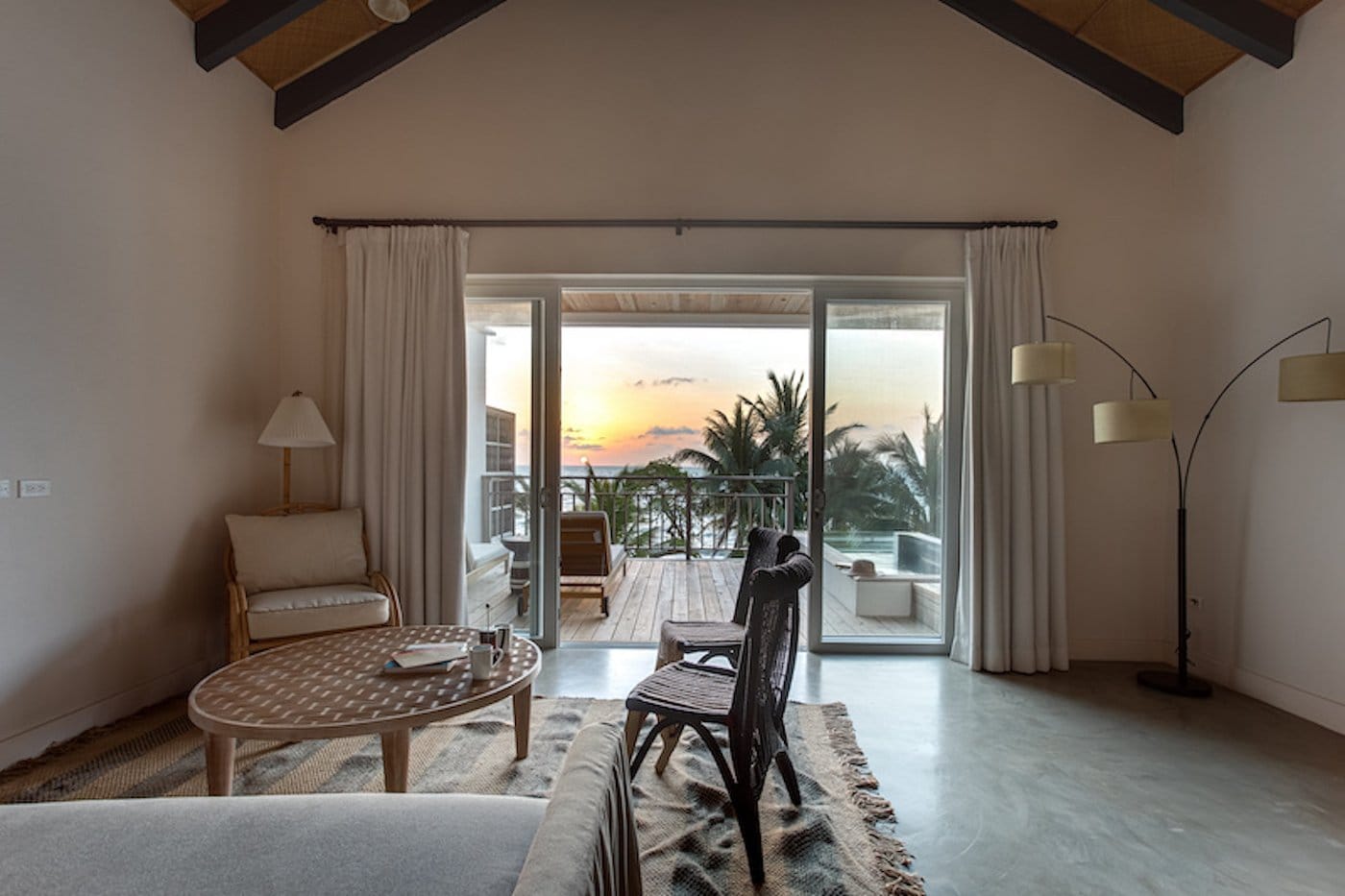 Bedroom in a One Bedroom Beachfront Villa at the February 2027 therapist CE retreat