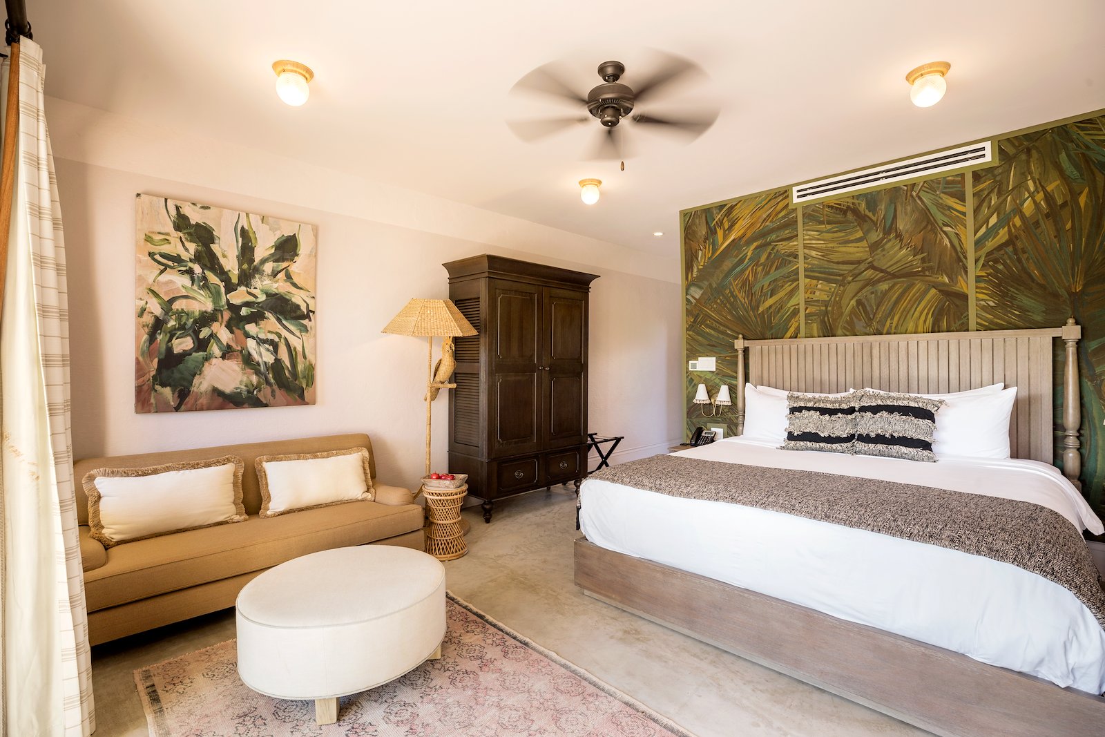 Private terrace and daybed off a Deluxe Room at the Placencia, Belize retreat venue