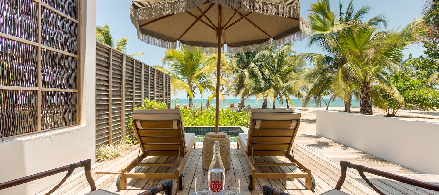 Relax in our dreamy Beachfront Suites with stylish décor and luxurious touches