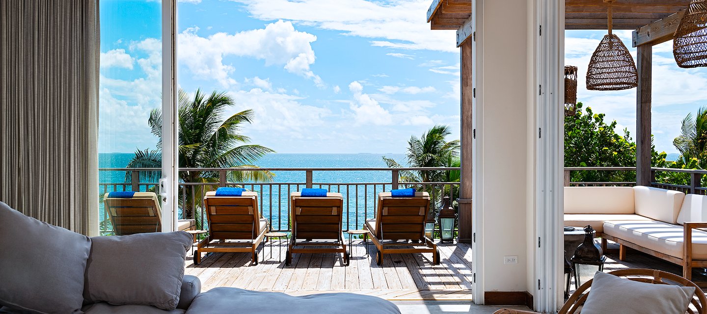 Seaview Three-Bedroom Penthouse terrace overlooking the Caribbean Sea at Itz’ana Belize