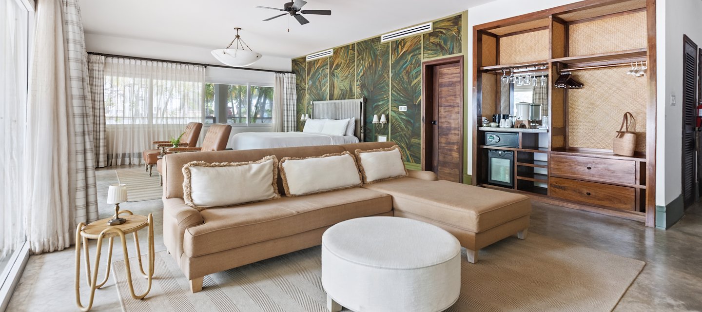 Relax in our dreamy Beachfront Suites with stylish décor and luxurious touches