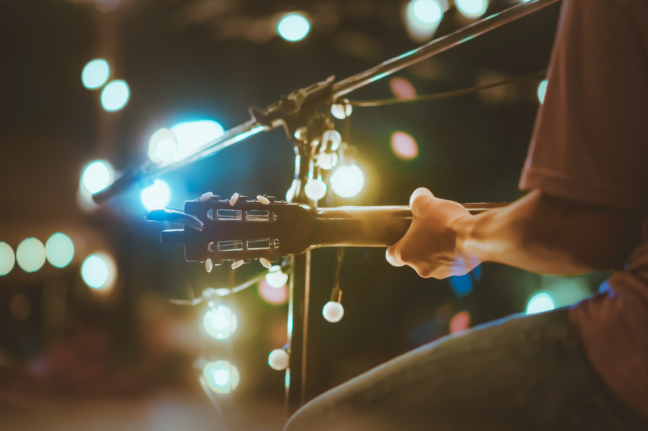 A person holding a guitar