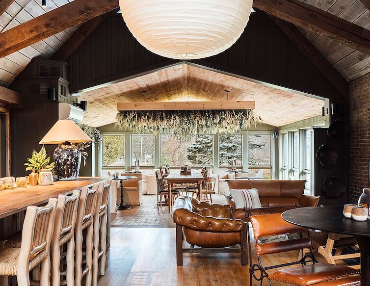 Lobby bar at AWOL Stowe under a large pendant light