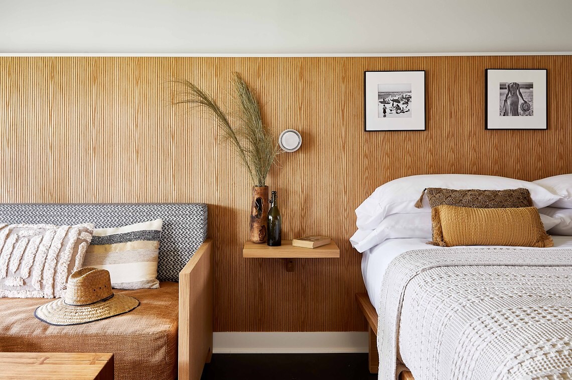Deluxe King Bed and Sofa Front View at Bluebird Dennisport, MA