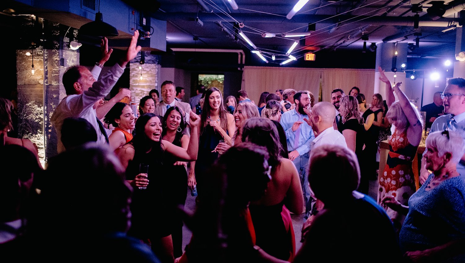Wedding reception guests dancing and celebrating at The Hotel Salem, MA
