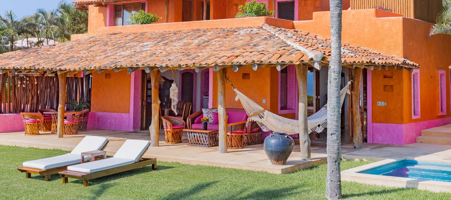 A beautiful open patio with a hammock and beach chairs, Las Alamandas Resort, Costalegre, Jalisco