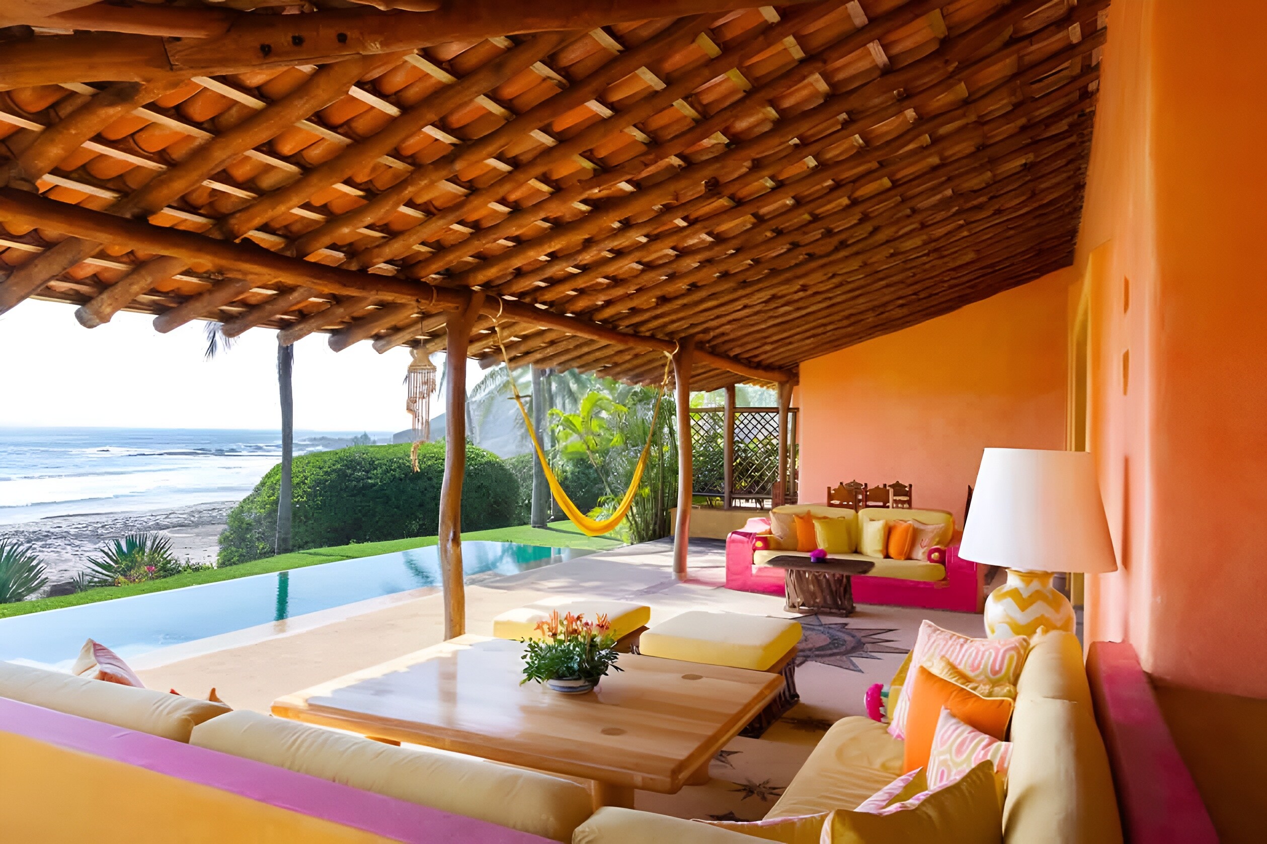 A beautiful patio with vibrant couches and a pool overlooking the sea, Las Alamandas Resort, Costalegre, Jalisco