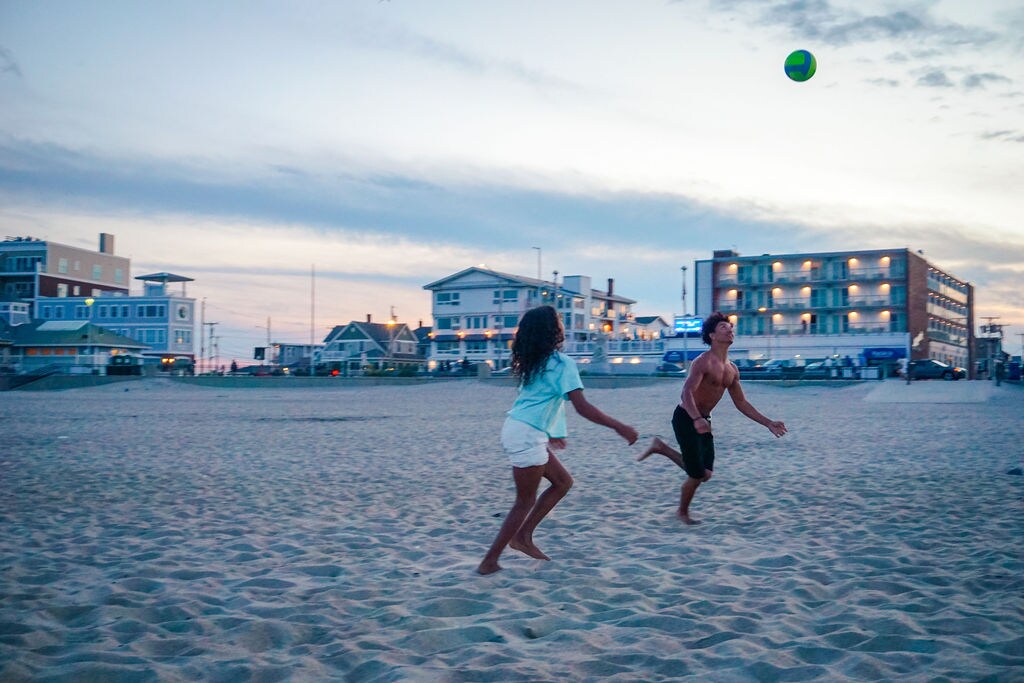 Couple Playing at Beach of Ashworth Hotel, New Hampshire