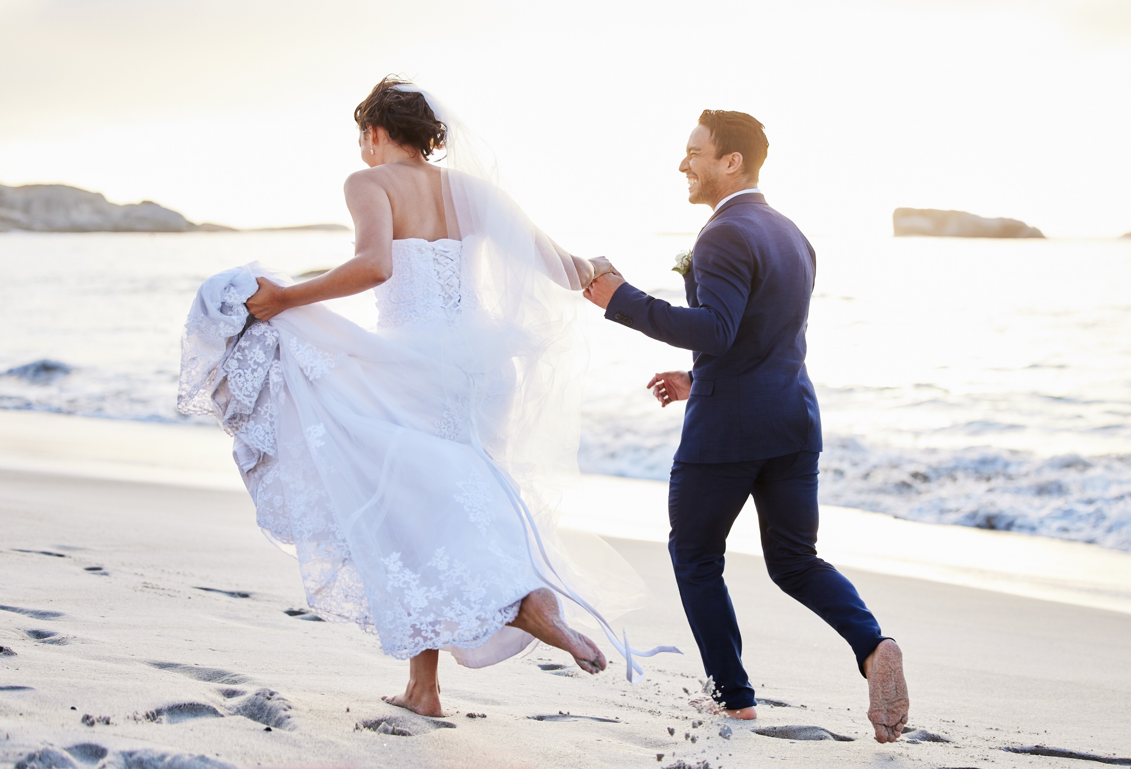 Couple Running at Beach of Ashworth Hotel, New Hampshire