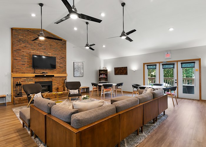 The living room at the village at the edge of the woods at California Apartments in Absecon, New Jersey