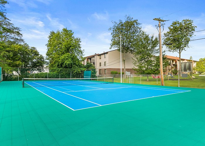 A tennis court with blue and green tiles, Country Club Apartments, Huntington, West Virginia