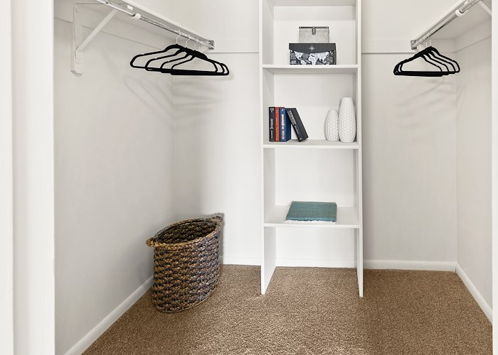 A walk in closet with shelves and clothes, East Mountain Apartments, Wilkes-Barre, Pennsylvania