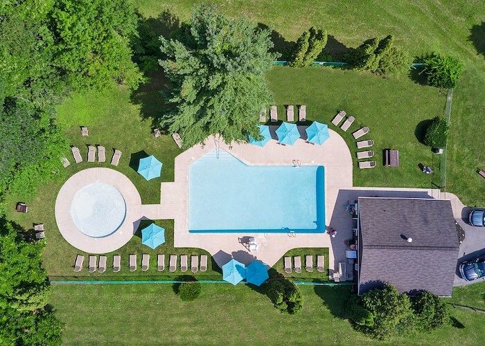 An aerial view of a pool and lawn area, Grampian Hills Apartments, Williamsport, Pennsylvania
