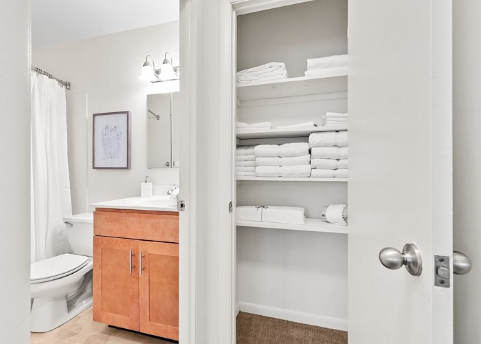 A bathroom with a toilet, sink and towel rack, Grampian Hills Apartments, Williamsport, Pennsylvania