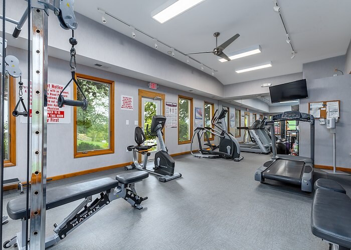 A gym room with exercise equipment and windows, Grampian Hills Apartments, Williamsport, Pennsylvania