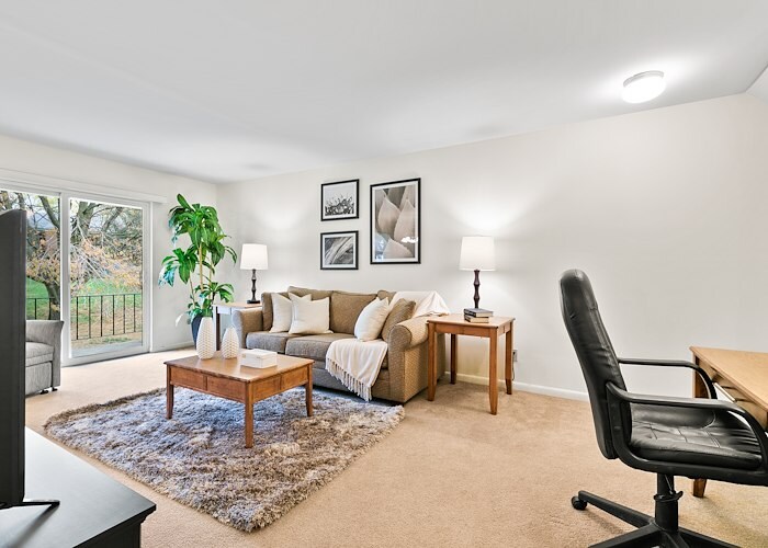 A living room with a couch, chair and television, Grampian Hills Apartments, Williamsport, Pennsylvania