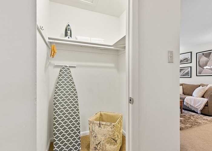 A small closet with a washer and dryer in it, Manor House Apartments, Lancaster, Pennsylvania