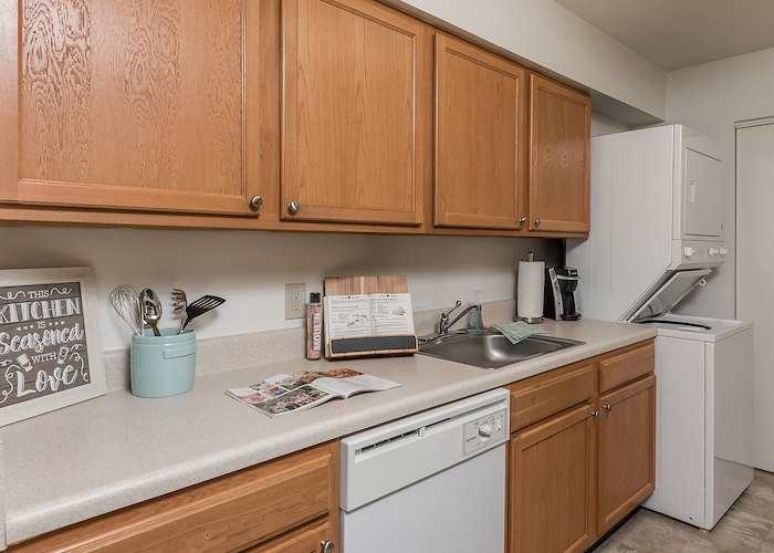 A kitchen with a dishwasher, microwave and refrigerator, Pikeview Manor Apartments, Beckley, West Virginia