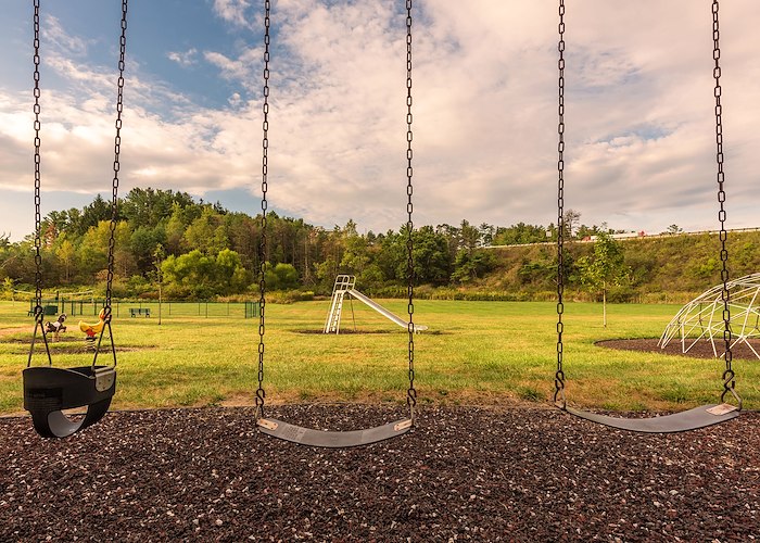 A playground with swings and a playground equipment, Pikeview Manor Apartments, Beckley, West Virginia
