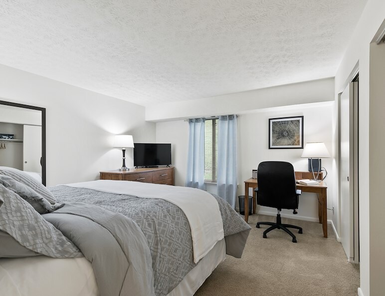 Furnished bedroom at Pikeview Manor Apartments in Beckley, WV