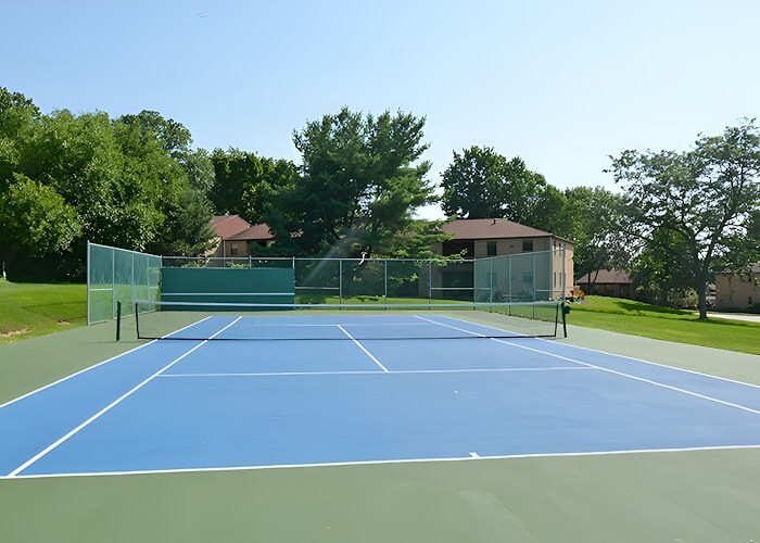 A tennis court with a net, Powder Mill Apartments, York, Pennsylvania