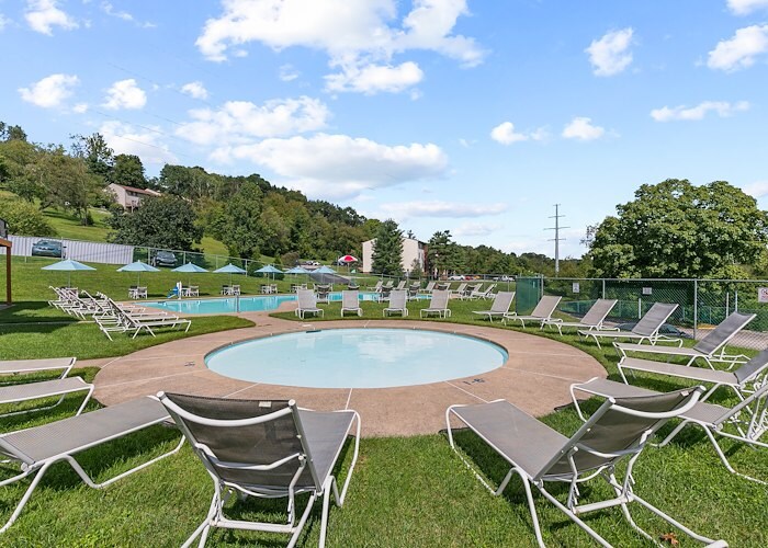 The pool at the resort is surrounded by lawn chairs, Roxalana Apartments, Dunbar, West Virginia