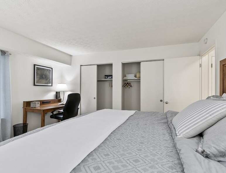 Furnished bedroom with double bed at Roxalana Hills Apartments in Dunbar, WV