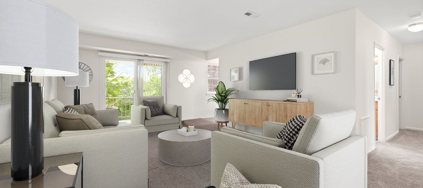 A living room with a couch, chair, and television, Grampian Hills Apartments, Williamsport, Pennsylvania