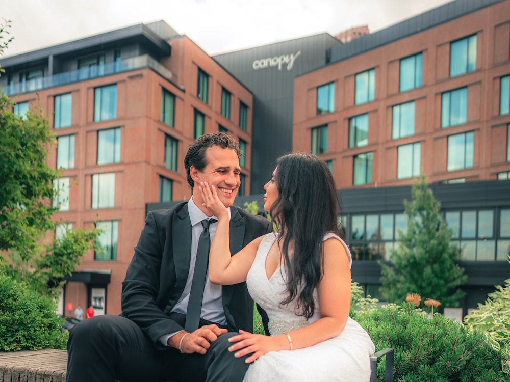 A couple enjoys a romantic moment at Canopy by Hilton Boston Downtown.