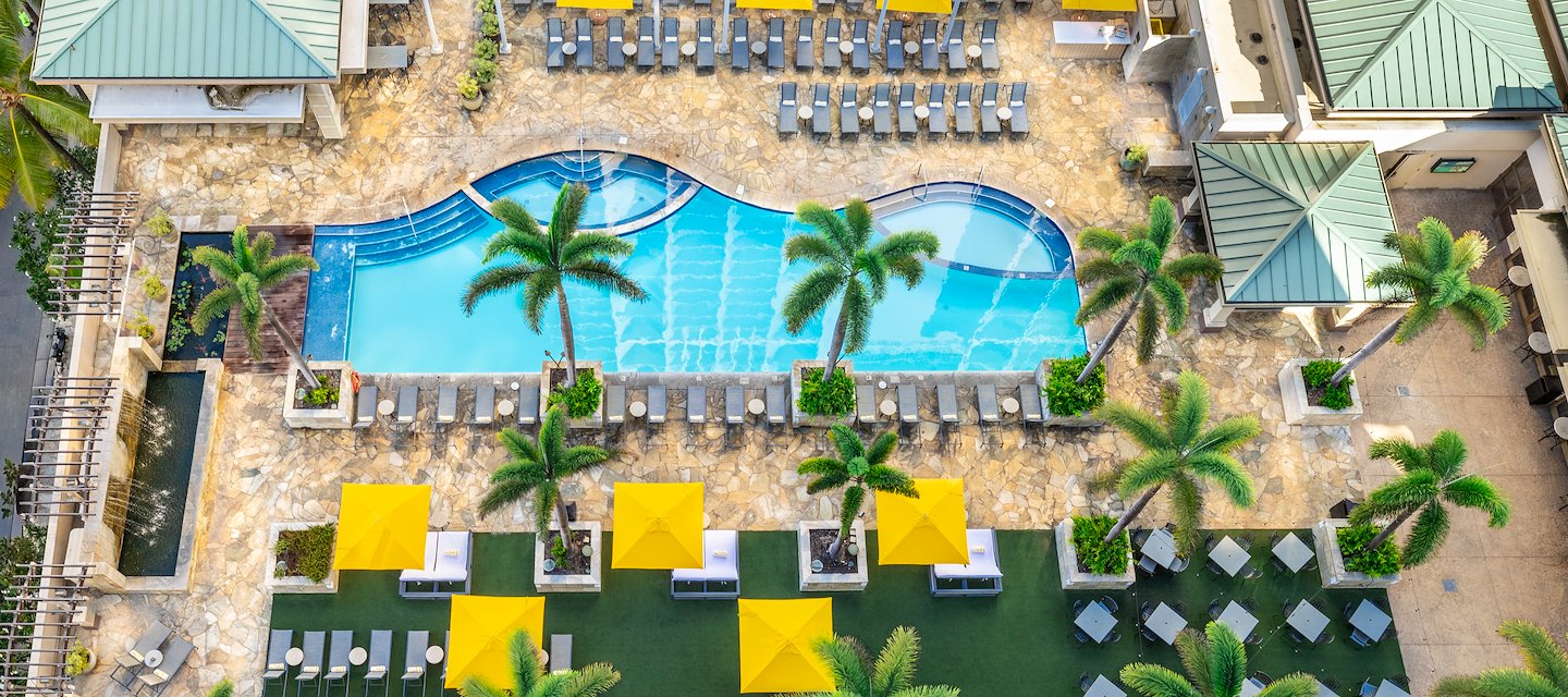 View of the pool area at Embassy Suites by Hilton Waikiki Beach Walk.