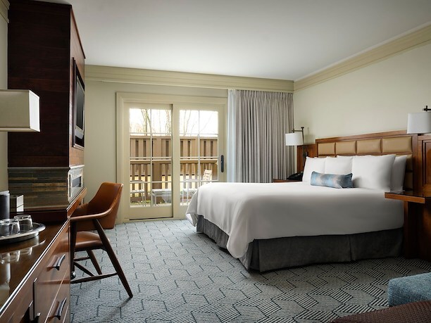 guest room with one hotel bed 