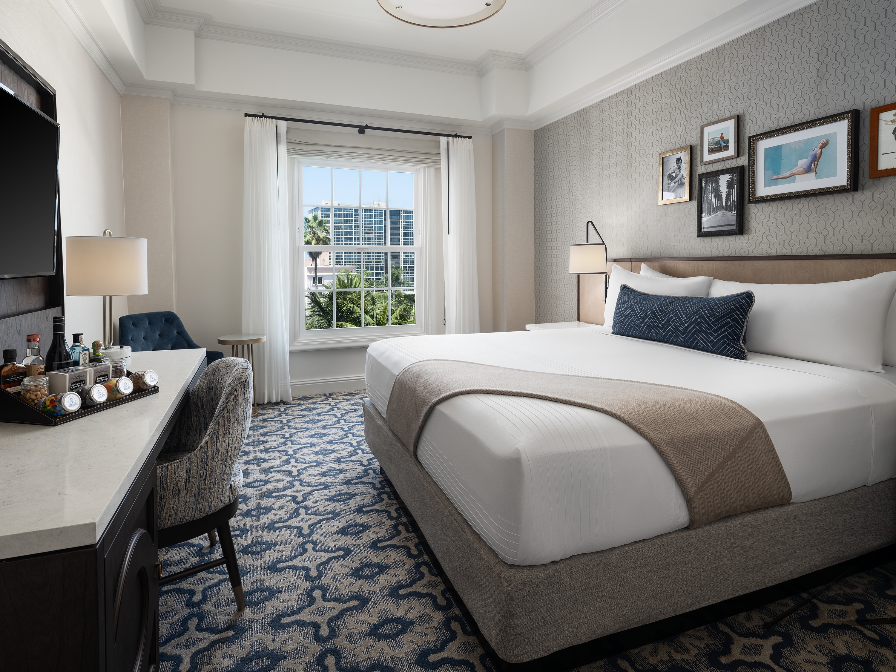 A hotel room with a bed, desk, and a tv, La Valencia Hotel, La Jolla, California