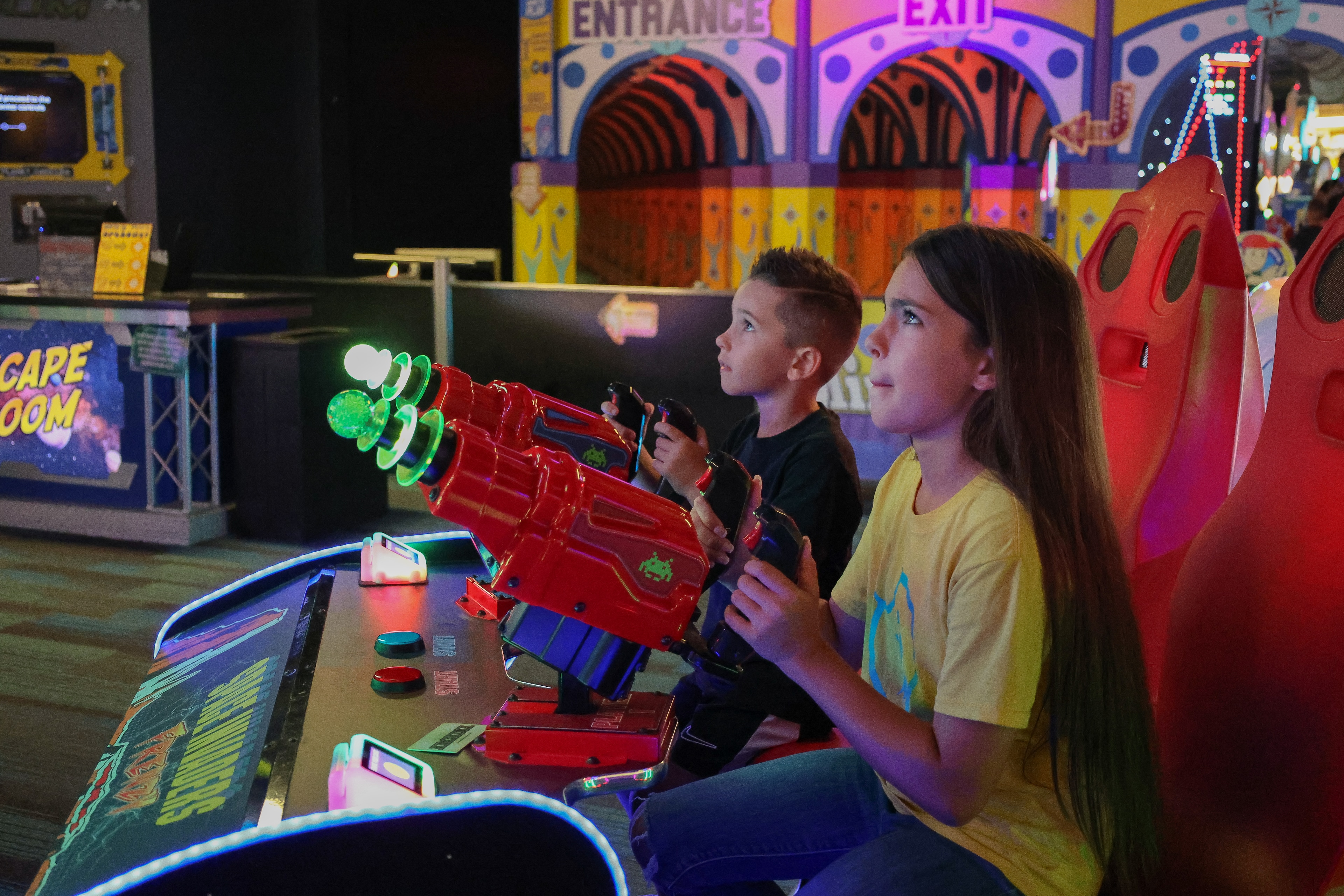 Kids are playing shooting game - Indoor Fun at Camelback Resort