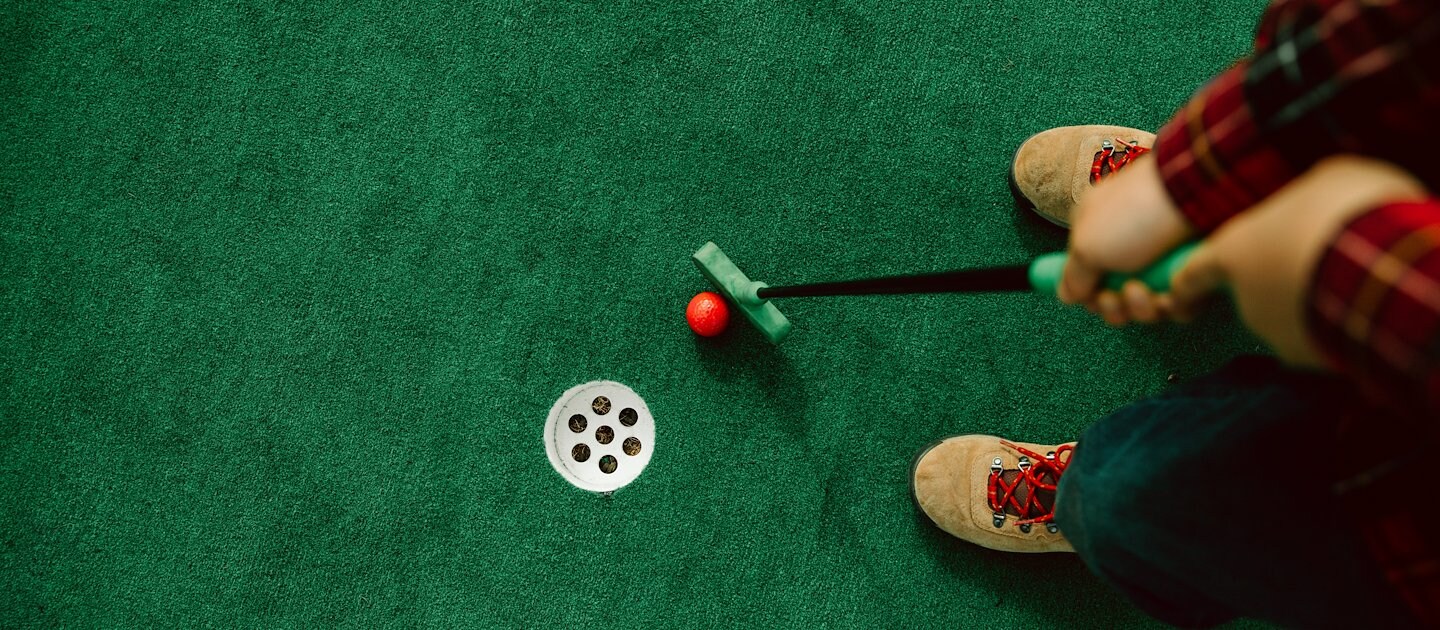 Family plays mini golf at Camelback Resort’s new attraction in Tannersville