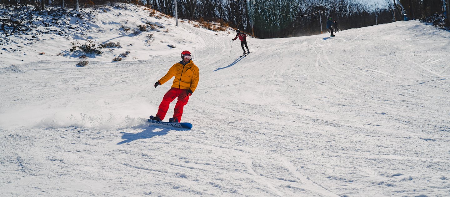 Snowboarding by teenage at Camelback Resort, Tannersville