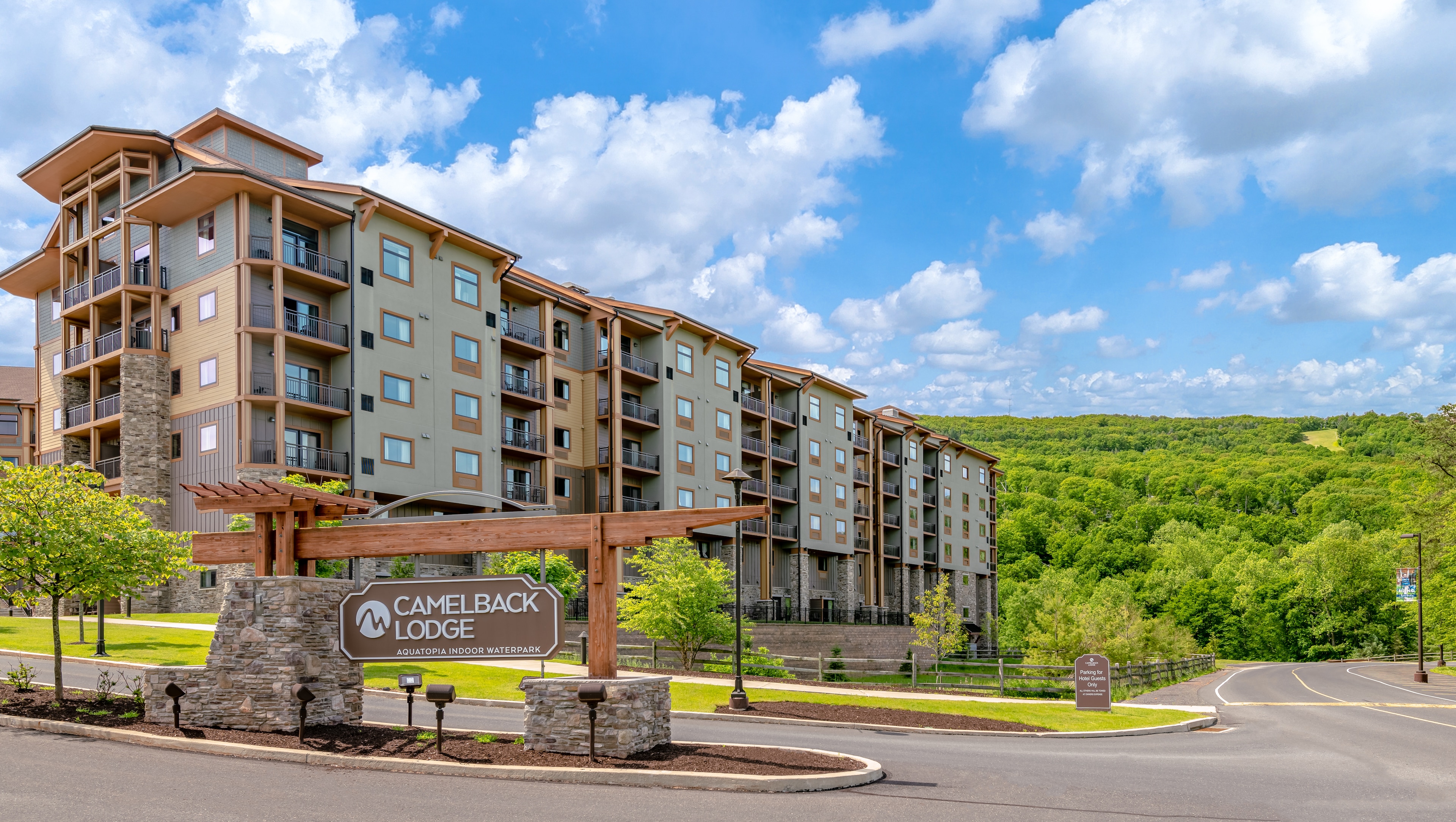Resort Information — Camelback Lodge surrounded by lush green hills in Tannersville
