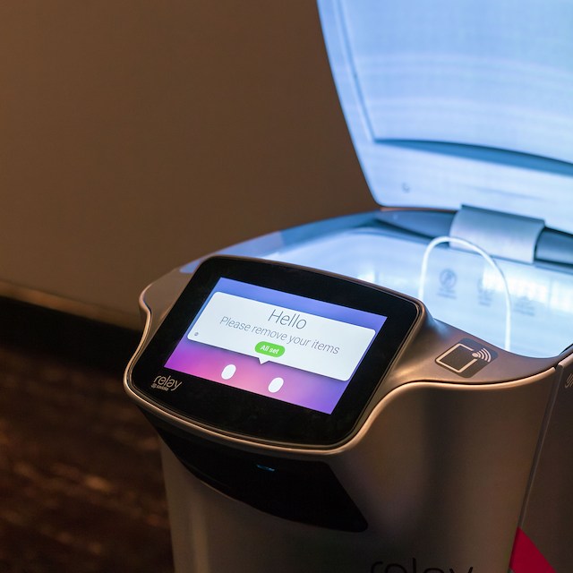 a small robot with a screen and button